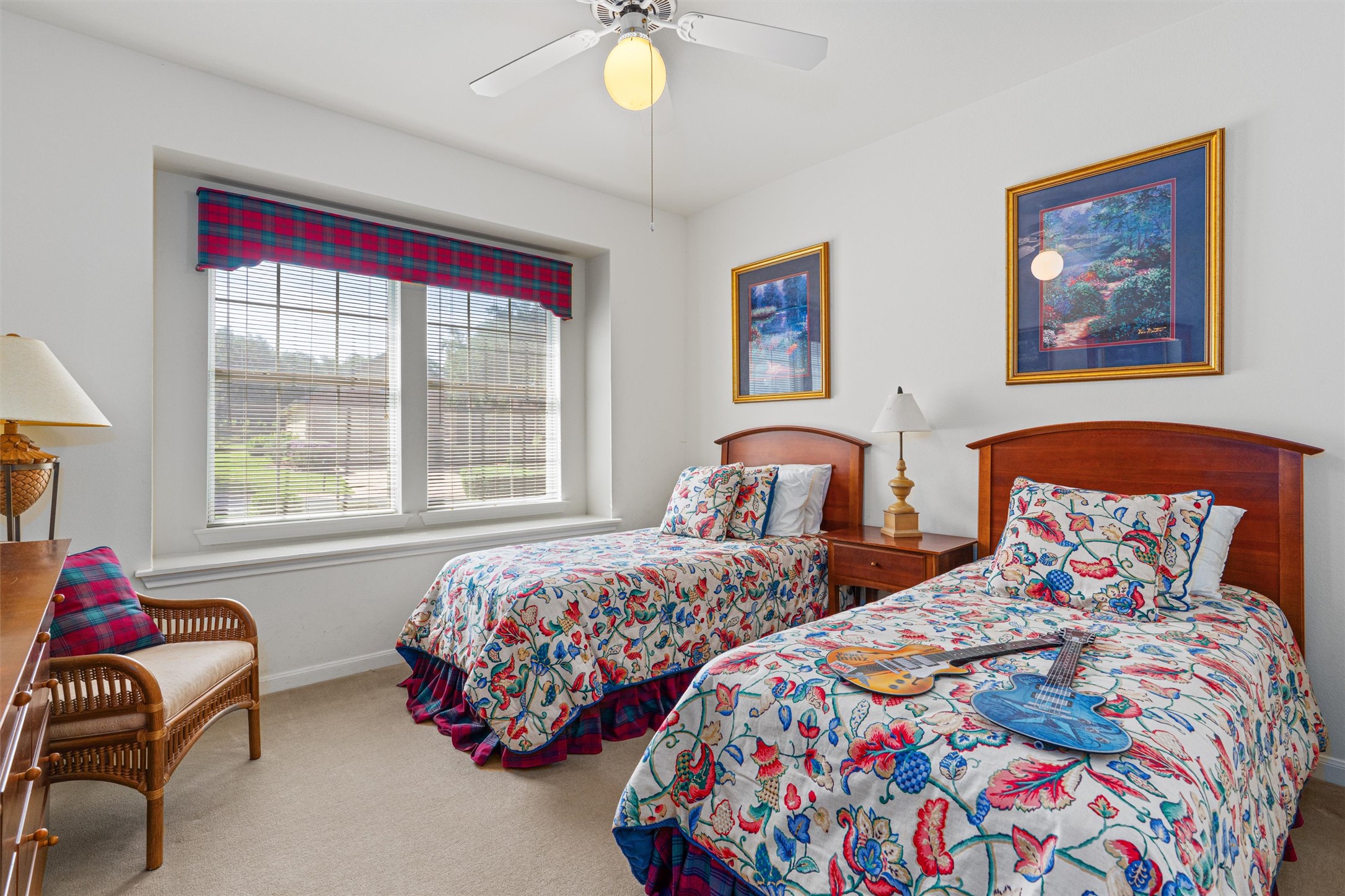 121 Larkspur Lane Georgetown, TX 78633 - Photo 16 of 28 a bedroom with two beds and a window