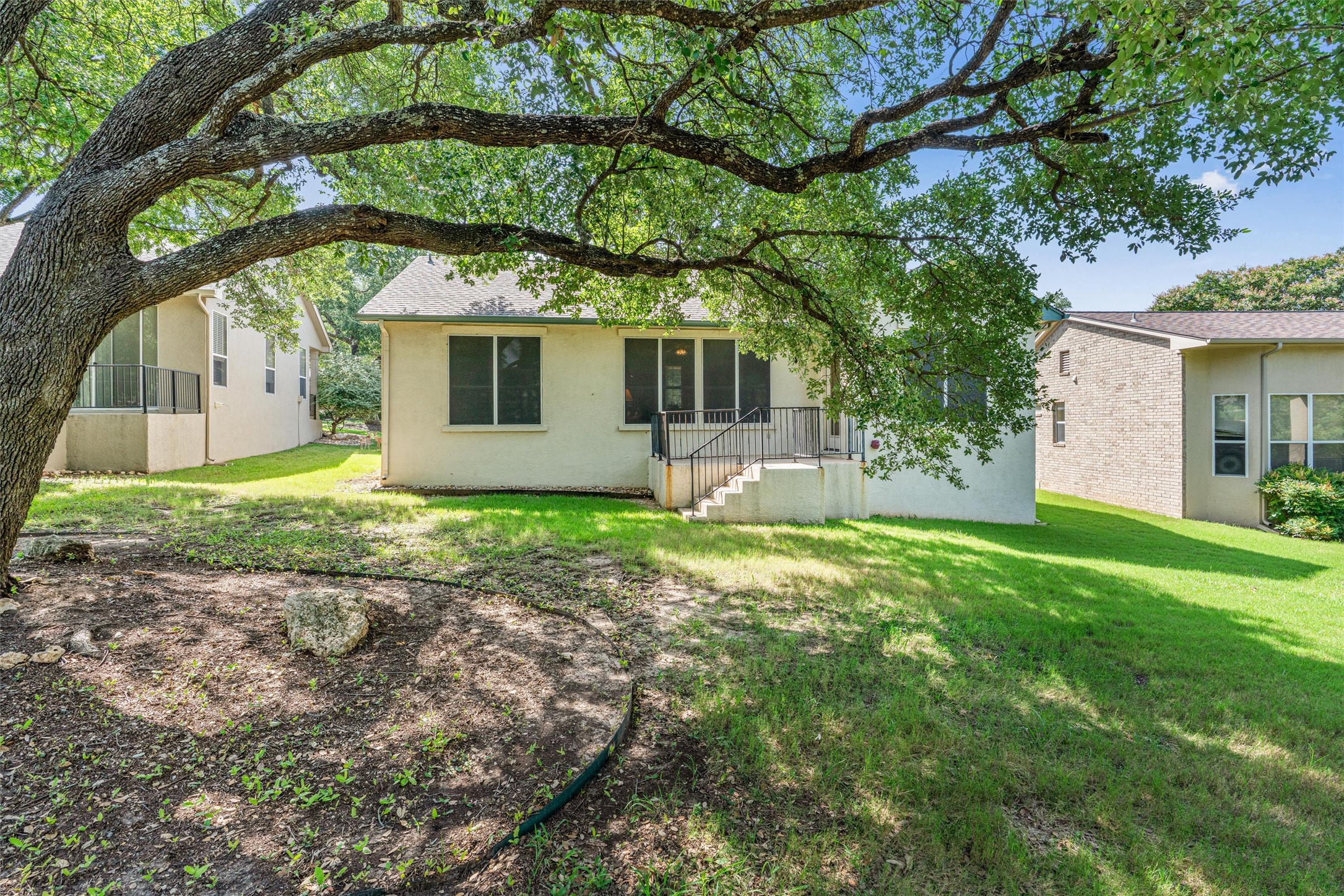 121 Larkspur Lane Georgetown, TX 78633 - Photo 24 of 28 a front view of house with yard and green space