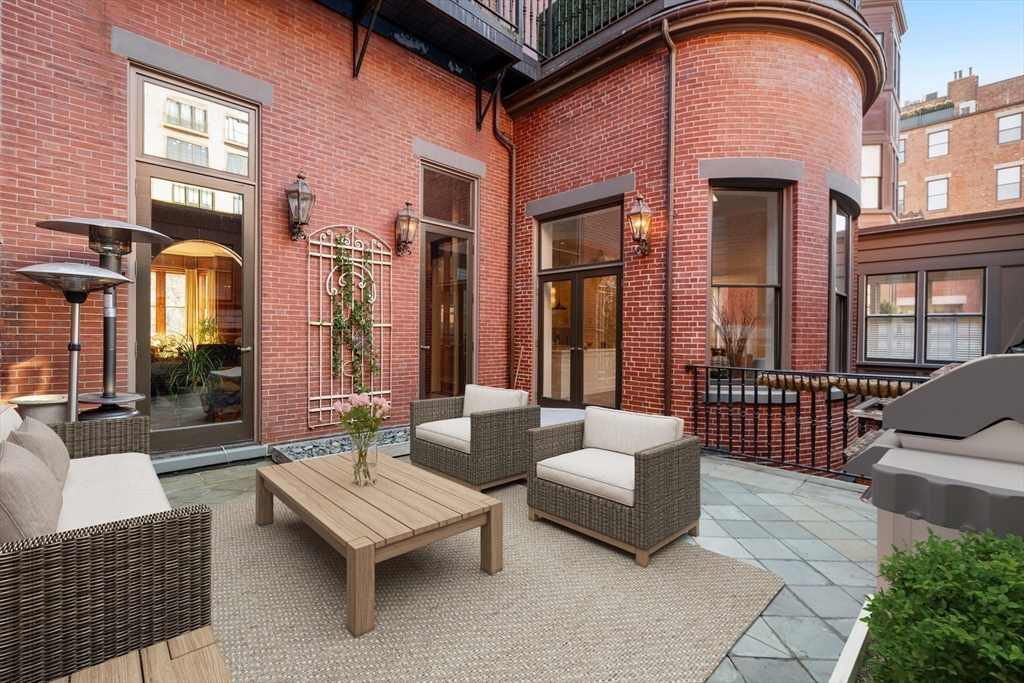 3 Commonwealth Avenue, Unit 1 Boston, MA 02116 - Photo 15 of 30 a building outdoor space with patio furniture