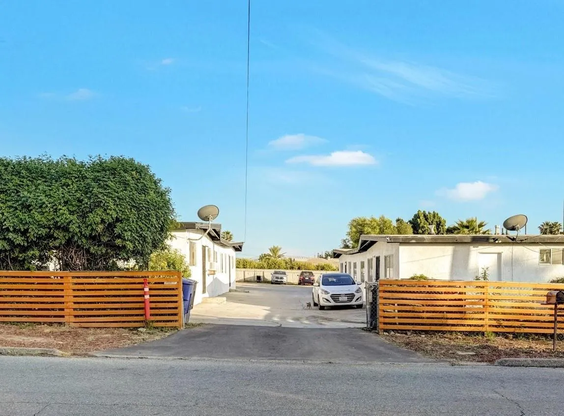 a view of a balcony with city