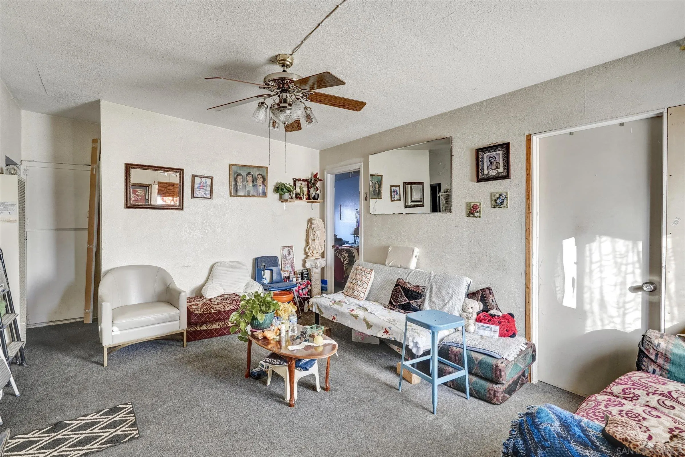 10260 Cook Avenue Riverside, CA 92503 - Photo 13 of 32 a living room with furniture and a window