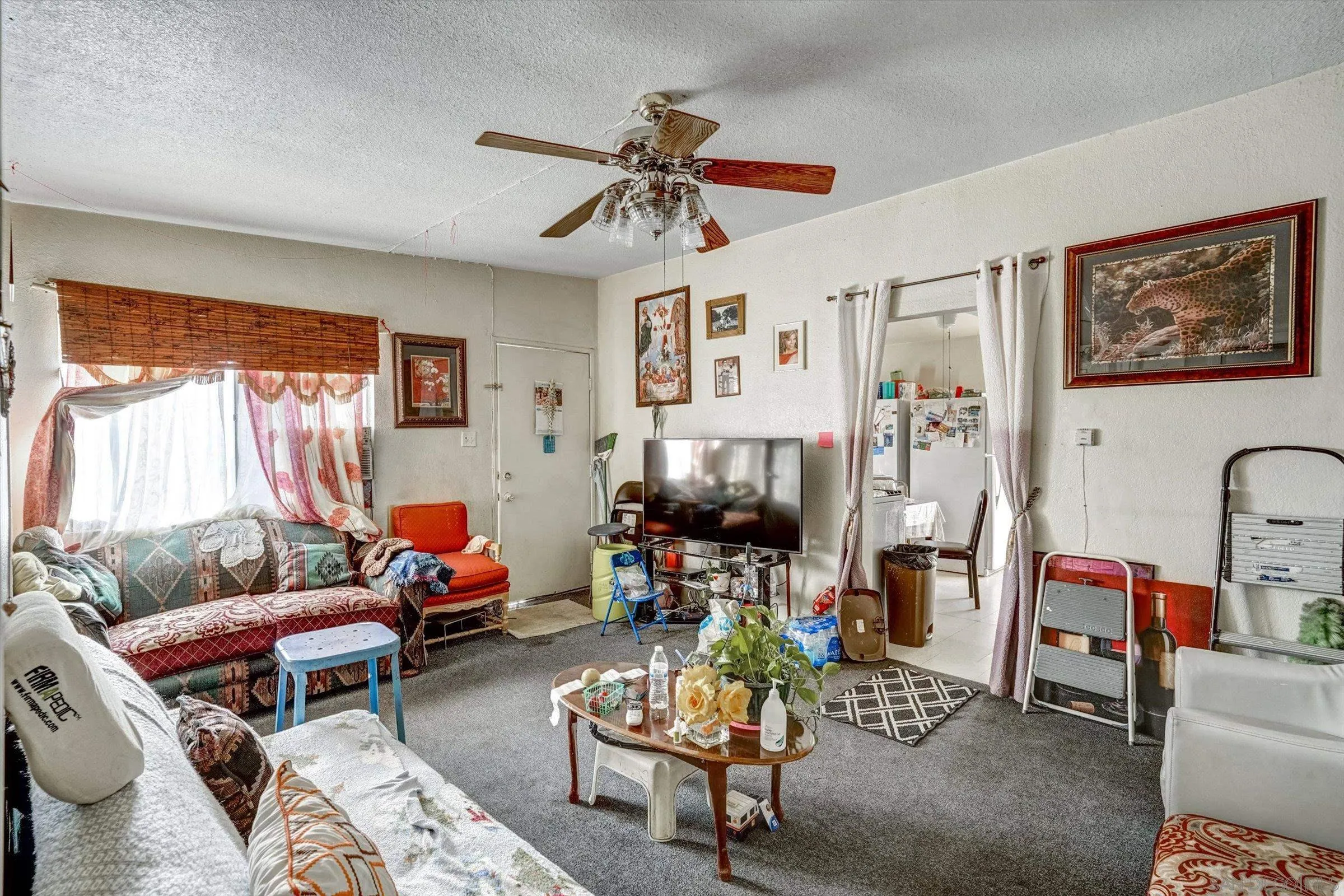 10260 Cook Avenue Riverside, CA 92503 - Photo 14 of 32 a living room with furniture a rug and a window