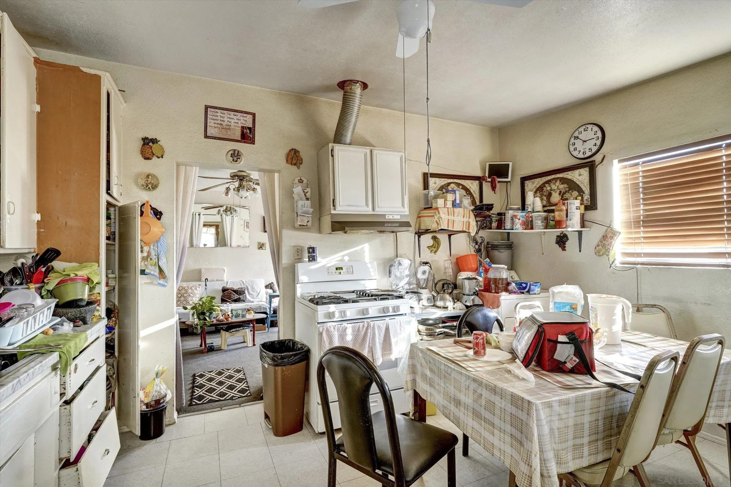 10260 Cook Avenue Riverside, CA 92503 - Photo 16 of 32 a view of a kitchen and dining room