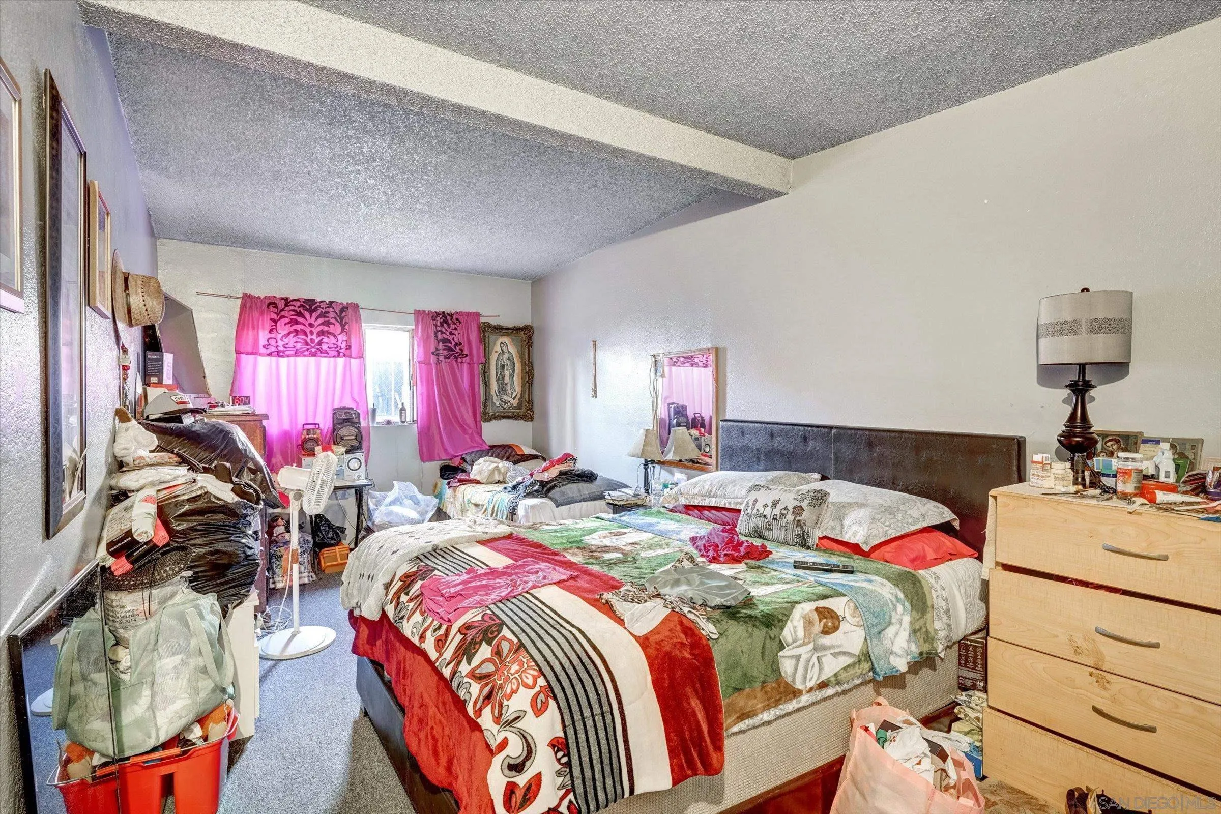 10260 Cook Avenue Riverside, CA 92503 - Photo 17 of 32 a bedroom with bed and a window