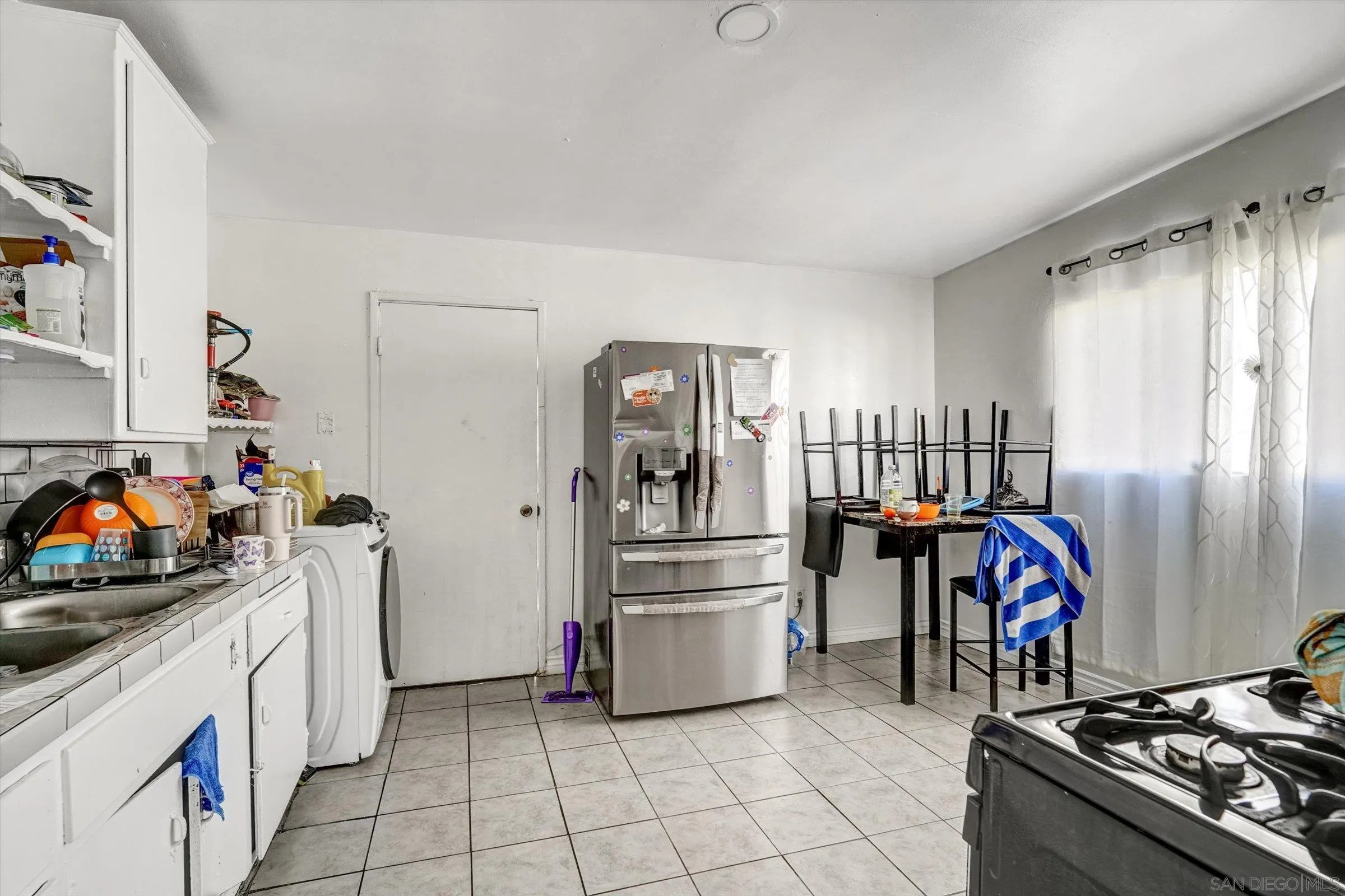 10260 Cook Avenue Riverside, CA 92503 - Photo 21 of 32 a kitchen with stainless steel appliances granite countertop a refrigerator and a stove