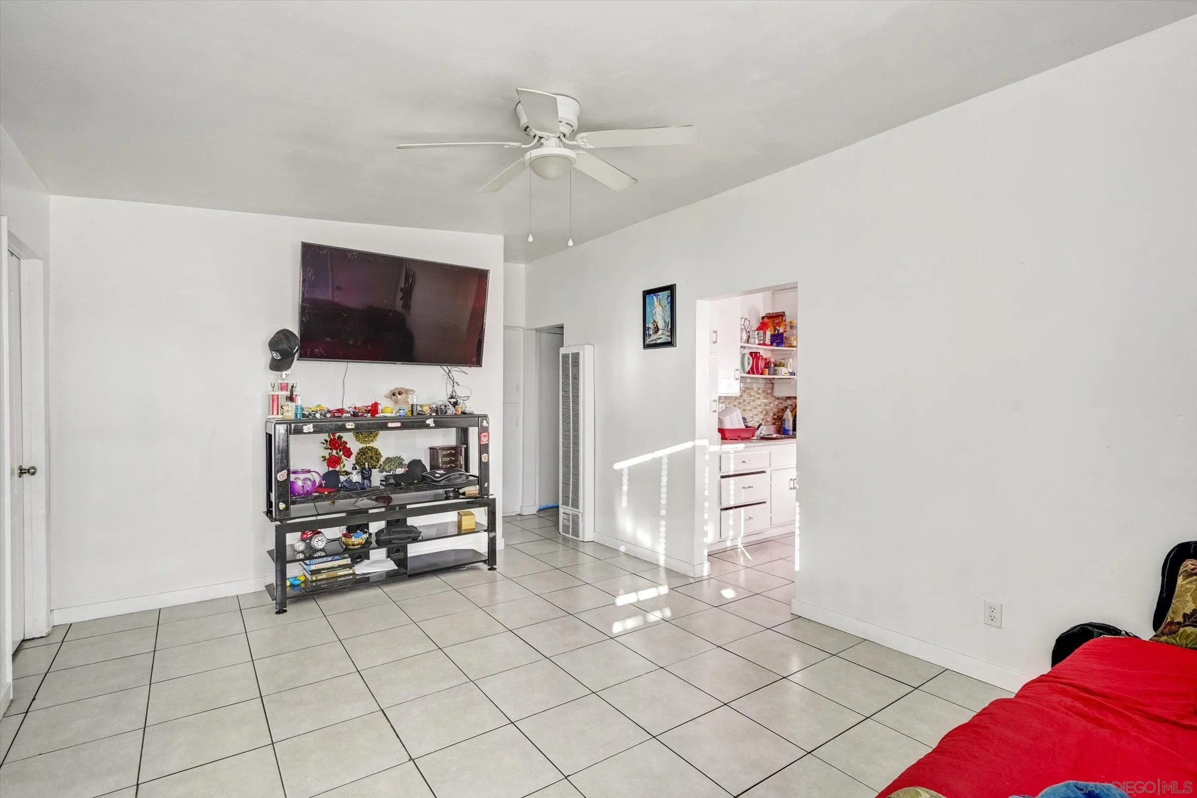 10260 Cook Avenue Riverside, CA 92503 - Photo 26 of 32 a view of a livingroom with fridge and workspace