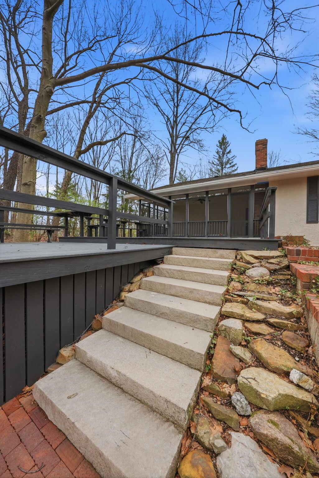 4445 Central College Road Westerville, OH 43081 - Photo 51 of 80 Stairs leading from paver patio to the decks.