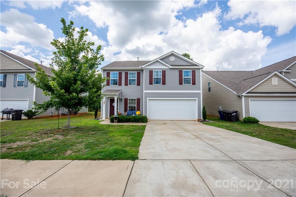 129 Mossy Pond Road Statesville, NC 28677 - Photo 2 of 47 a front view of a house with a yard