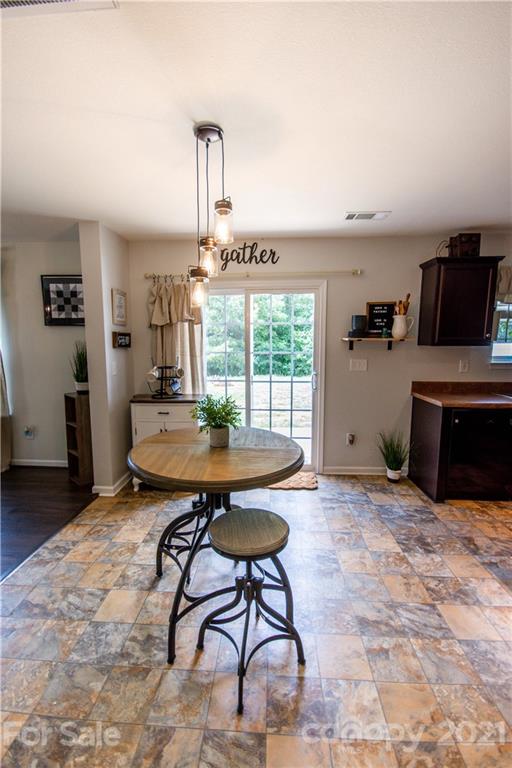129 Mossy Pond Road Statesville, NC 28677 - Photo 16 of 47 a room with furniture and a window