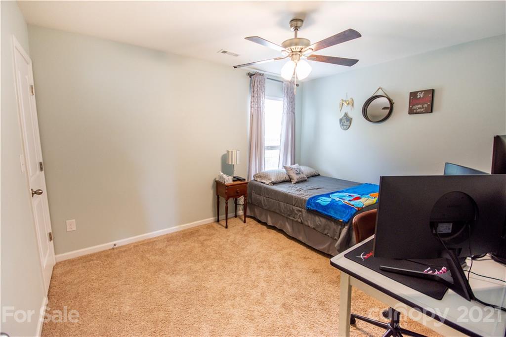 129 Mossy Pond Road Statesville, NC 28677 - Photo 32 of 47 a living room with furniture