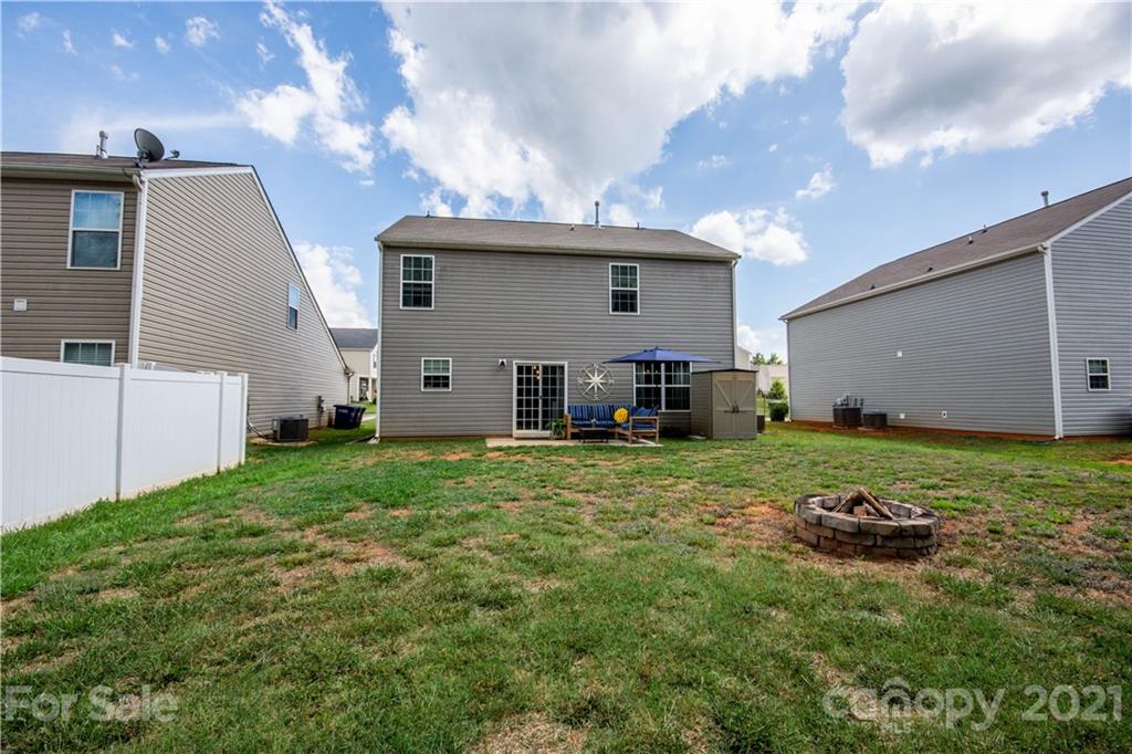 129 Mossy Pond Road Statesville, NC 28677 - Photo 40 of 47 a house view with a backyard space