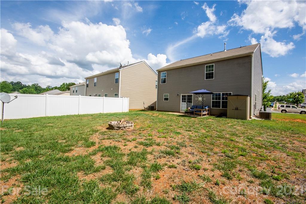 129 Mossy Pond Road Statesville, NC 28677 - Photo 43 of 47 a backyard of a house