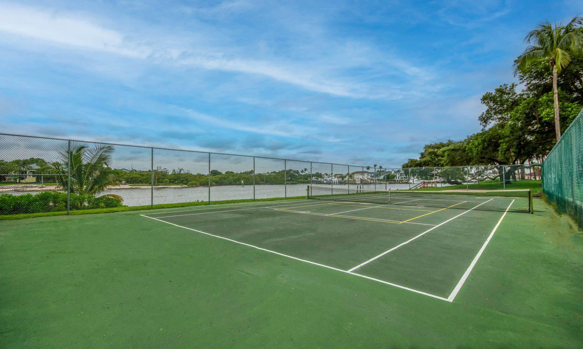 390 Golfview Road, Unit G North Palm Beach, FL 33408 - Photo 31 of 36 a view of a tennis court