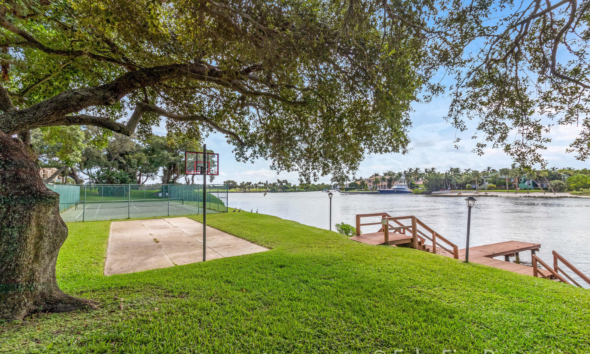 390 Golfview Road, Unit G North Palm Beach, FL 33408 - Photo 35 of 36 a view of a lake with a park