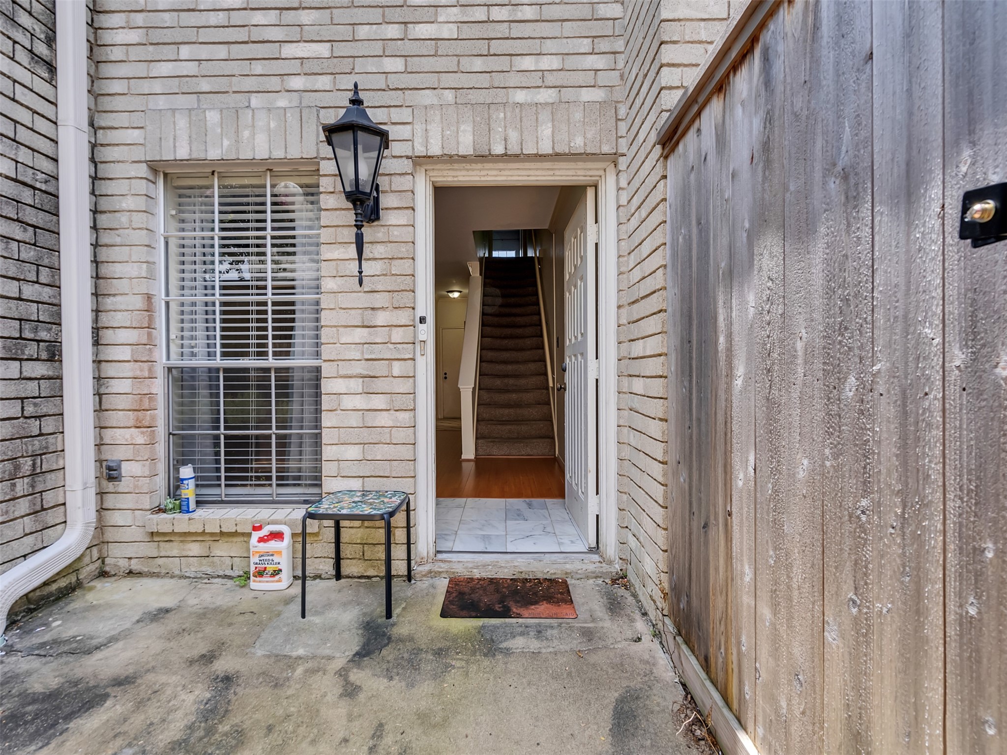 4001 Tanglewilde Street, Unit 605 Houston, TX 77063 - Photo 4 of 29 a view of wooden door with a chair