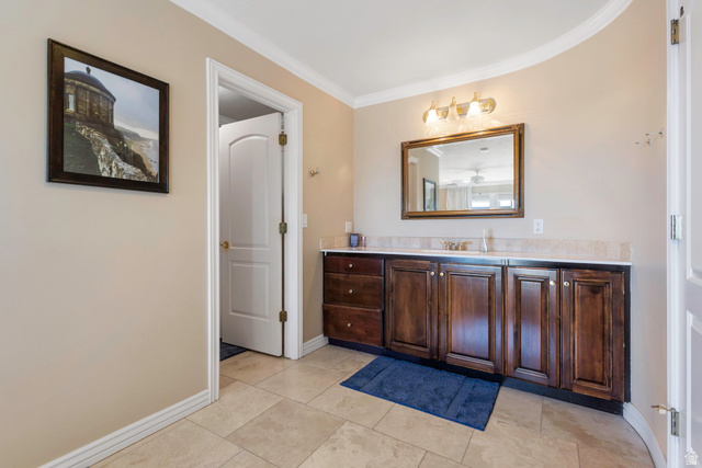 684 North Summit Way Alpine, UT 84004 - Photo 42 of 58 Bathroom with vanity, ornamental molding, and light tile patterned flooring
