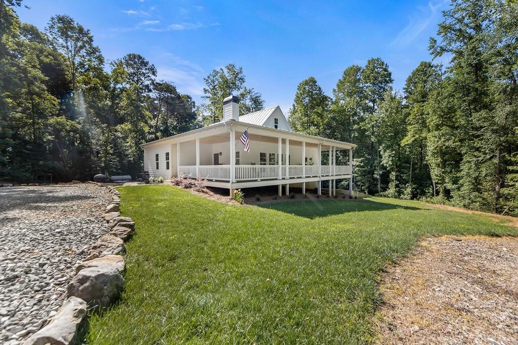 582 Fred Pitts Road Demorest, GA 30535 - Photo 1 of 1 a view of a house with a big yard