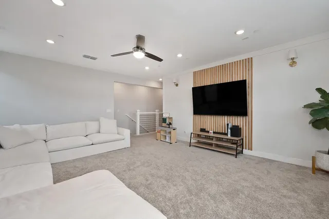 a pathway of a house with a yard