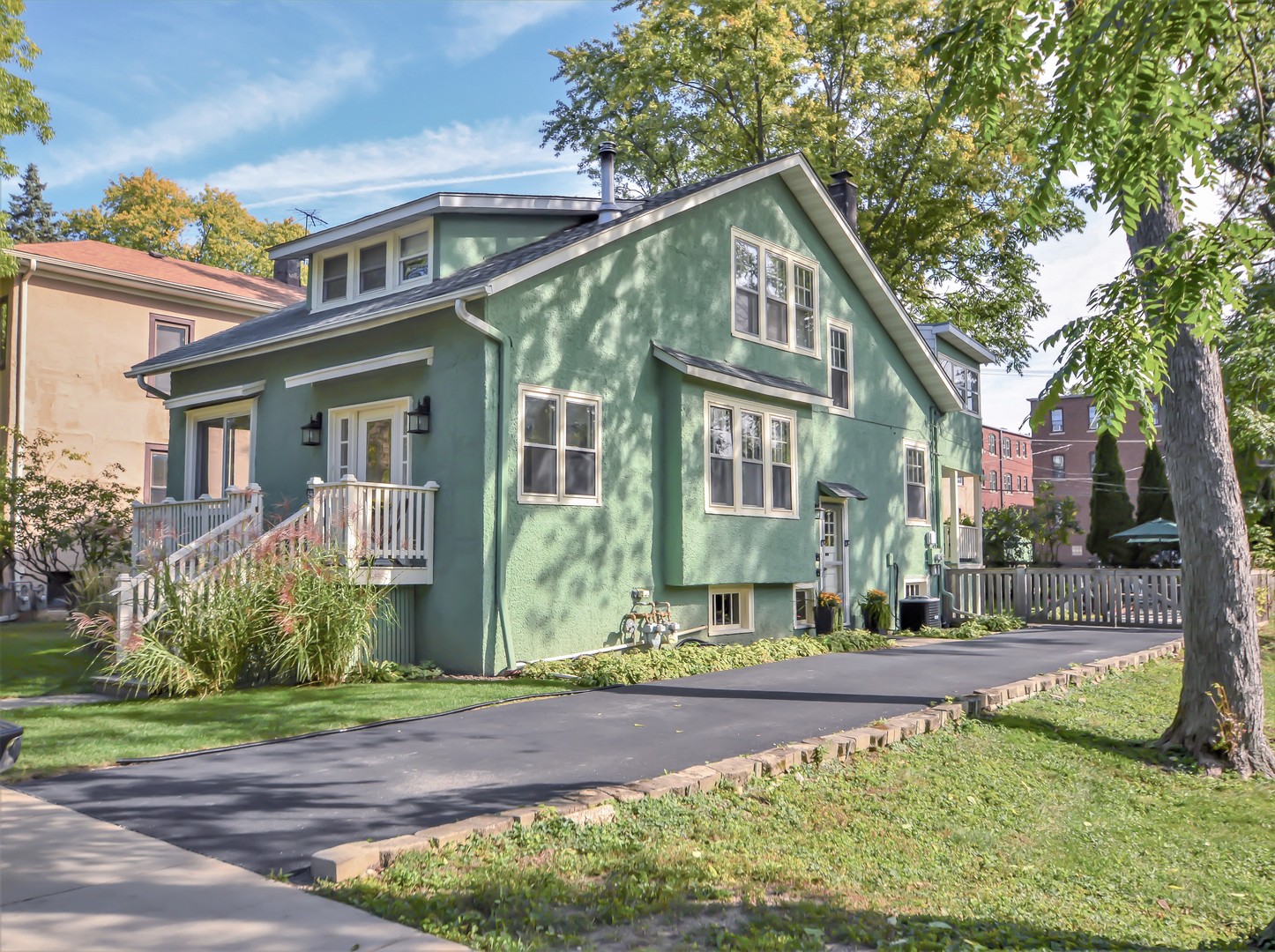 111 Groveland Avenue Riverside, IL 60546 - Photo 1 of 40 a front view of a house with a yard