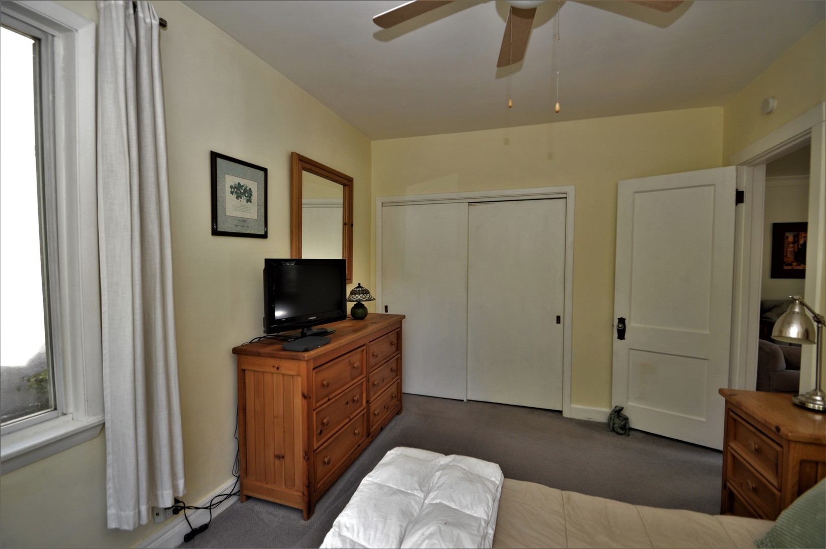 111 Groveland Avenue Riverside, IL 60546 - Photo 12 of 40 a living room with furniture and a flat screen tv