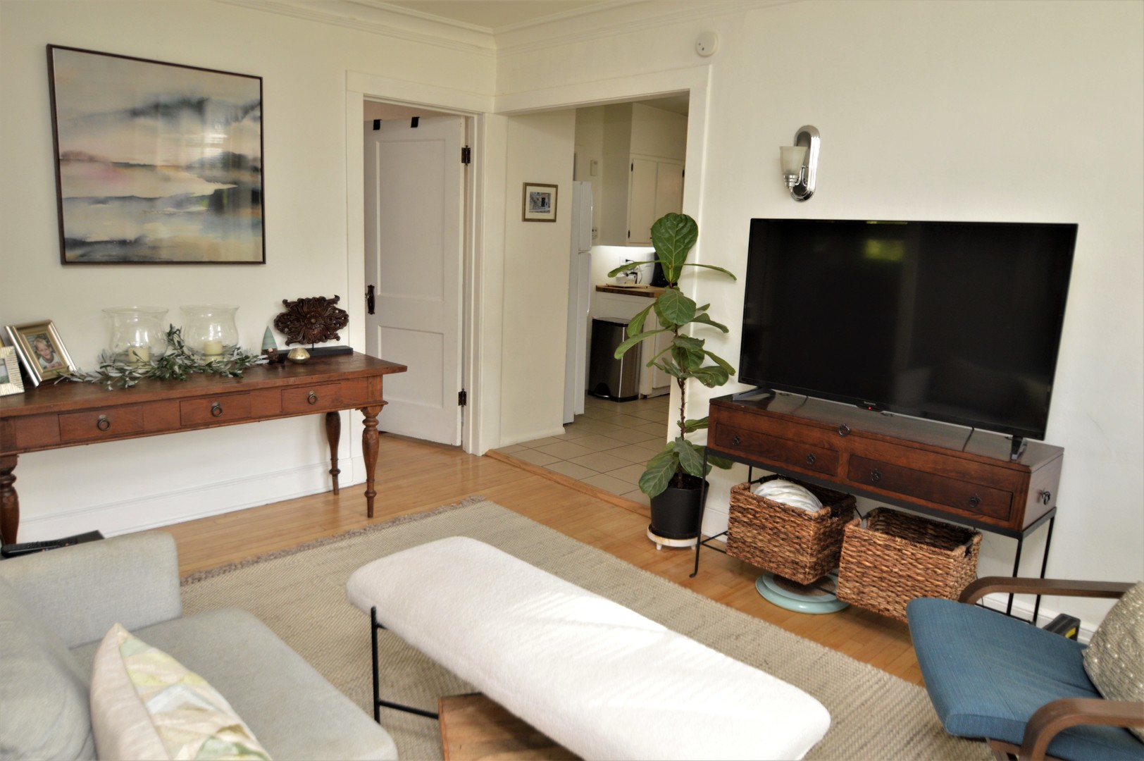 111 Groveland Avenue Riverside, IL 60546 - Photo 18 of 40 a living room with furniture and a flat screen tv