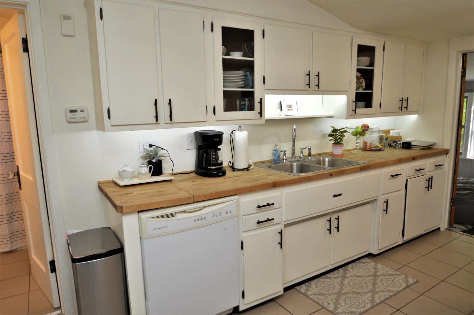 111 Groveland Avenue Riverside, IL 60546 - Photo 23 of 40 a kitchen with cabinets appliances and a sink