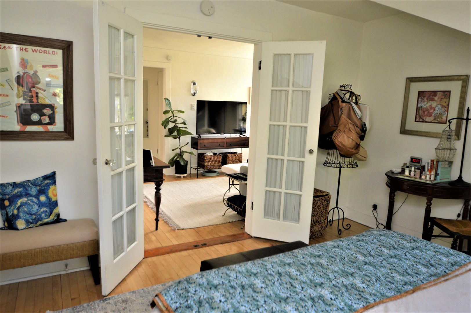 111 Groveland Avenue Riverside, IL 60546 - Photo 25 of 40 a living room with furniture a flat screen tv and a rug