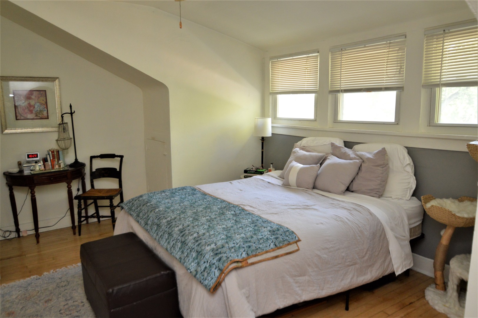 111 Groveland Avenue Riverside, IL 60546 - Photo 26 of 40 a bedroom with a bed and a table in it