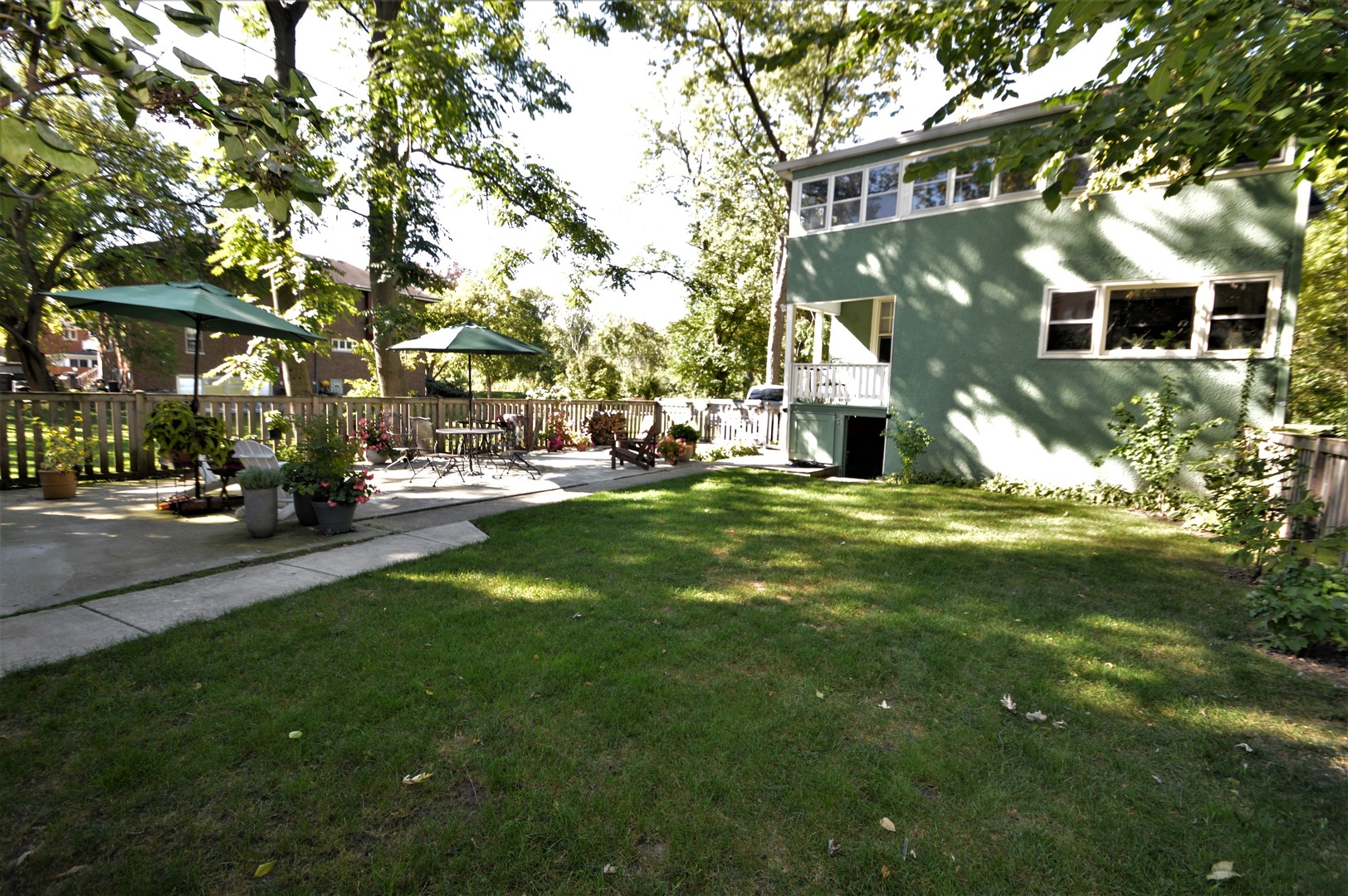 111 Groveland Avenue Riverside, IL 60546 - Photo 38 of 40 a view of a building with a yard