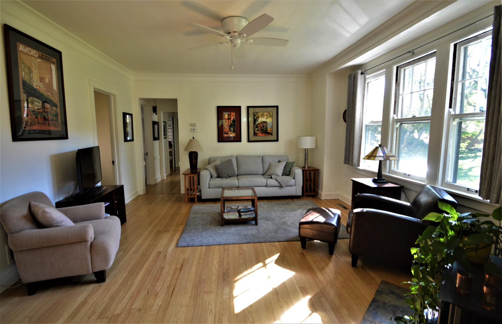 111 Groveland Avenue Riverside, IL 60546 - Photo 4 of 40 a living room with furniture fireplace and a large window