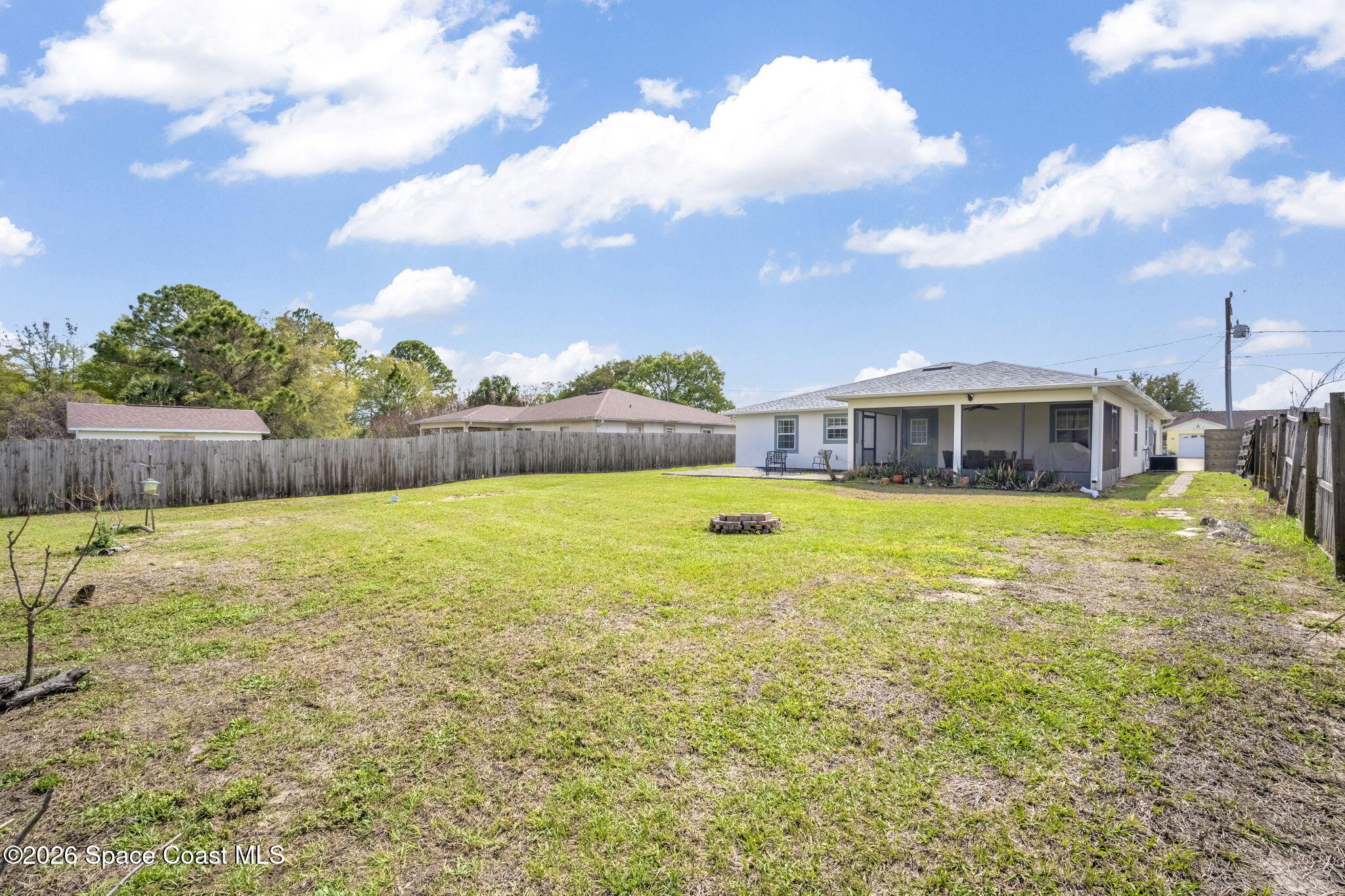 3404 Kilbee Street Mims, FL 32754 - Photo 27 of 30 a view of house with a garden