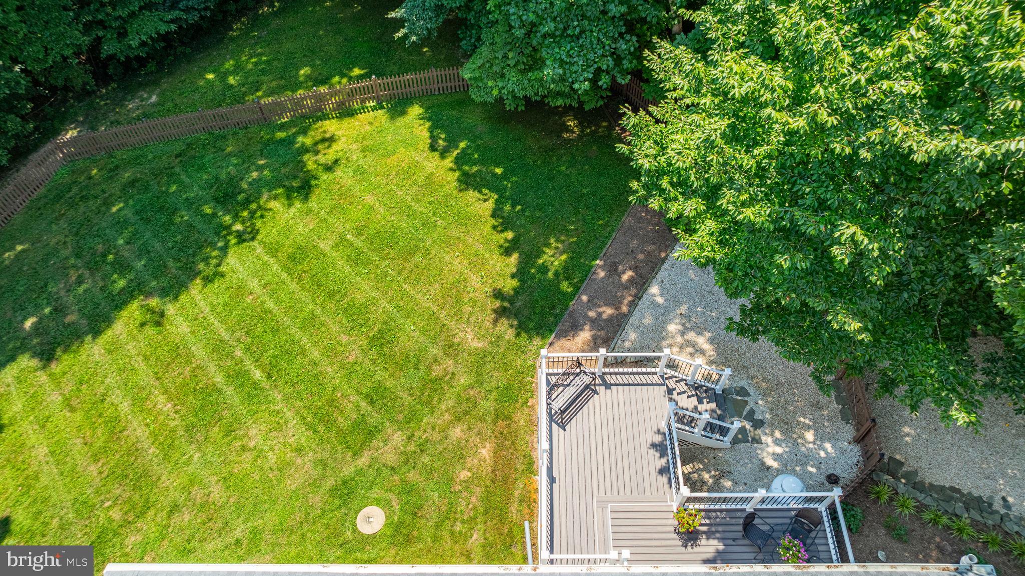 9741 Howes Road Dunkirk, MD 20754 - Photo 41 of 48 an aerial view of residential houses with outdoor space and trees