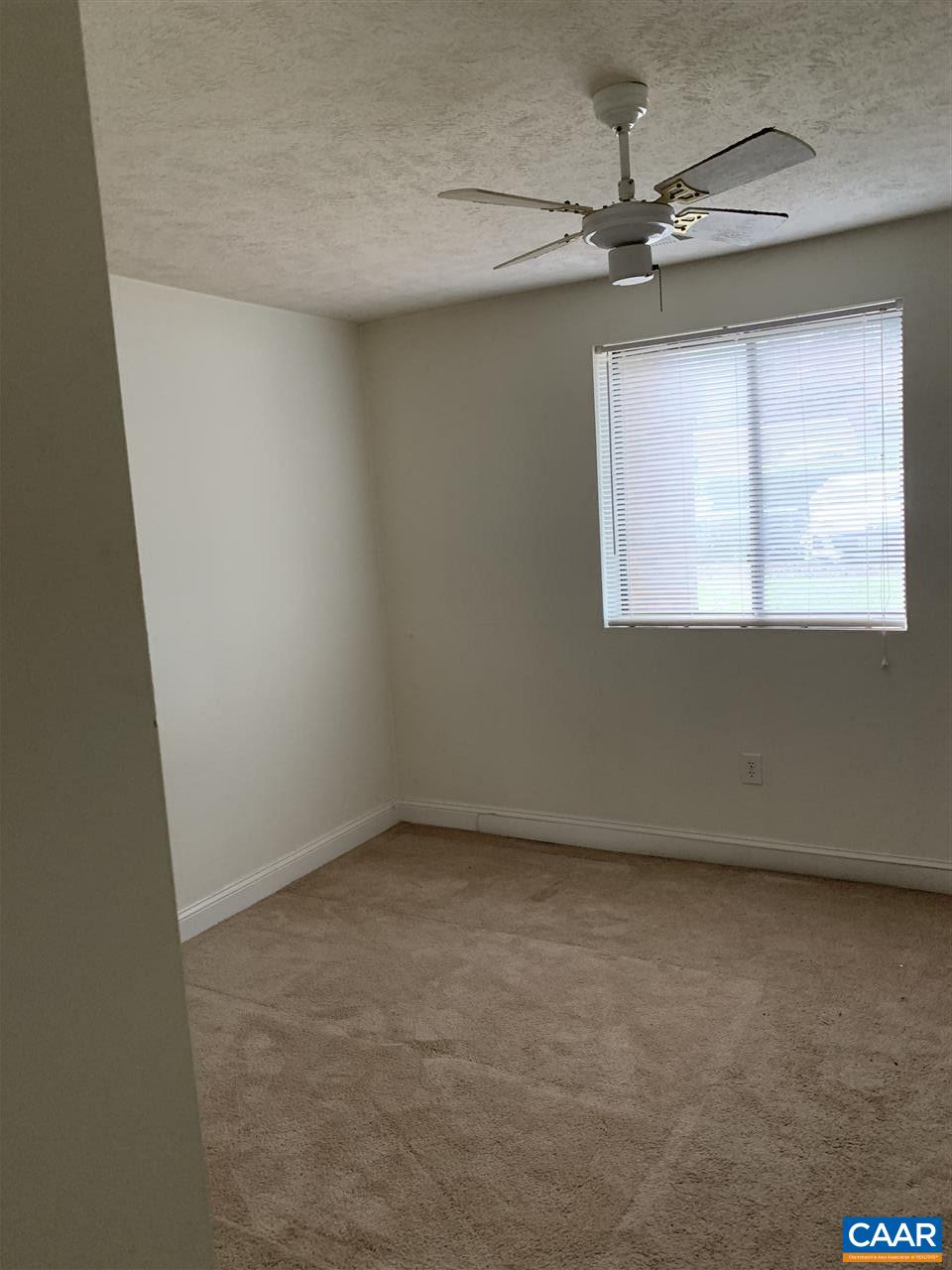118 Turtle Creek Road, Unit 1 Charlottesville, VA 22901 - Photo 5 of 7 an empty room with a window
