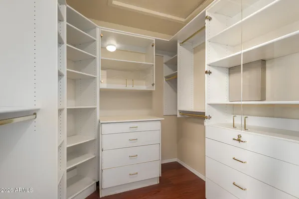 a view of an empty walk in closet