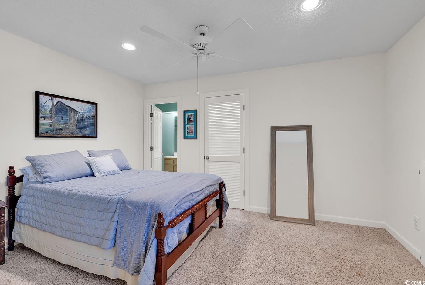 8234 Timber Ridge Road Conway, SC 29526 - Photo 27 of 39 Carpeted bedroom featuring ceiling fan, a closet,