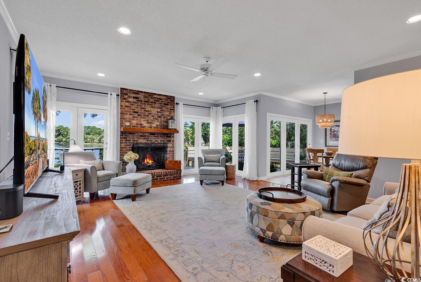 8234 Timber Ridge Road Conway, SC 29526 - Photo 3 of 39 Living room with hardwood / wood-style flooring, o