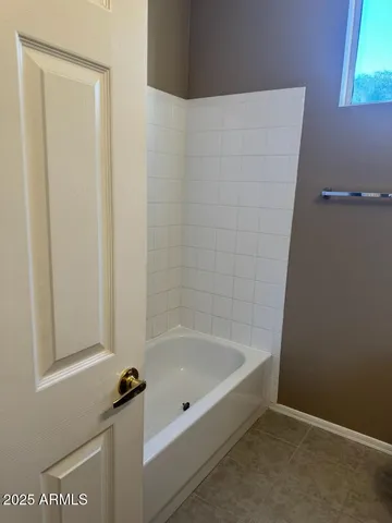 a bathroom with a bathtub