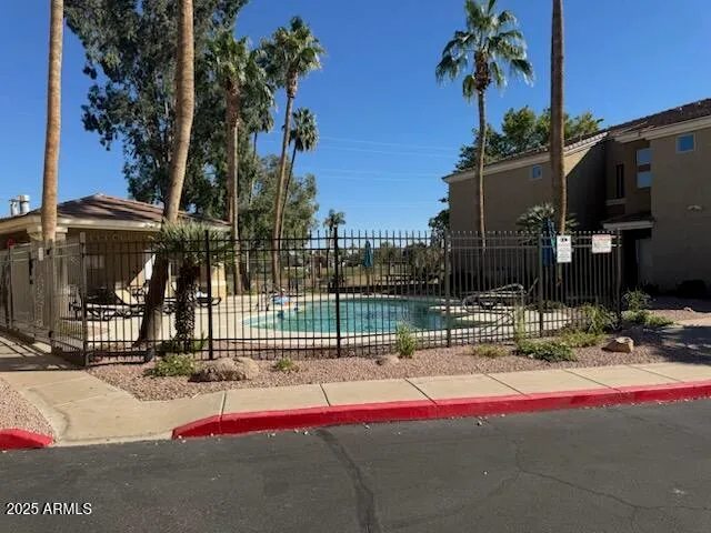 a view of fountain in front of a building