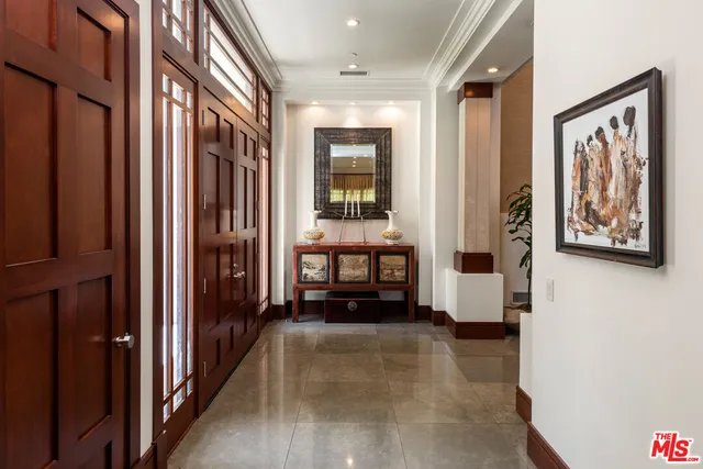 a view of a hallway with a furniture