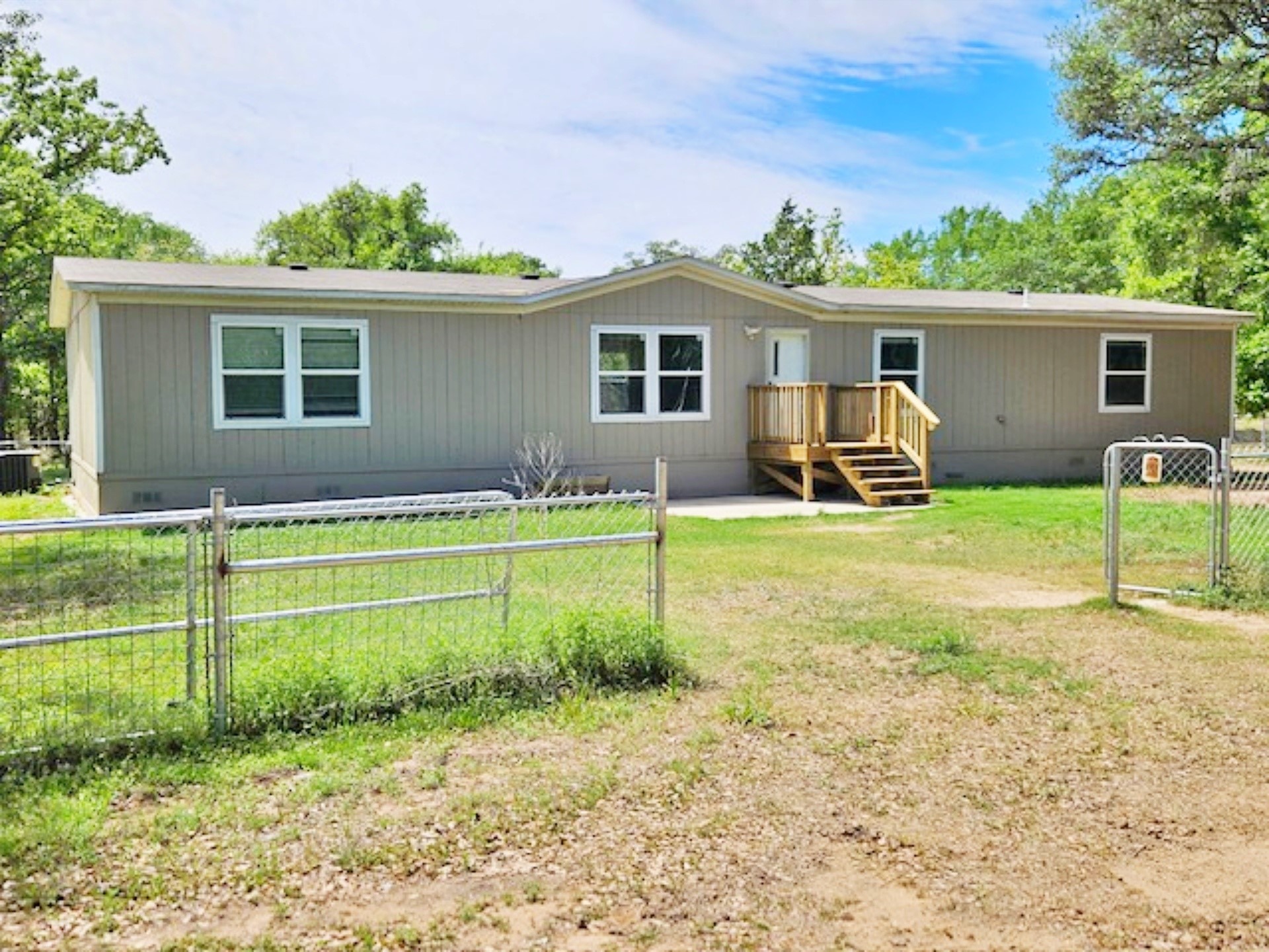 1032 Reeves Road Garwood, TX 77442 - Photo 18 of 29 a house view with a sitting space and garden