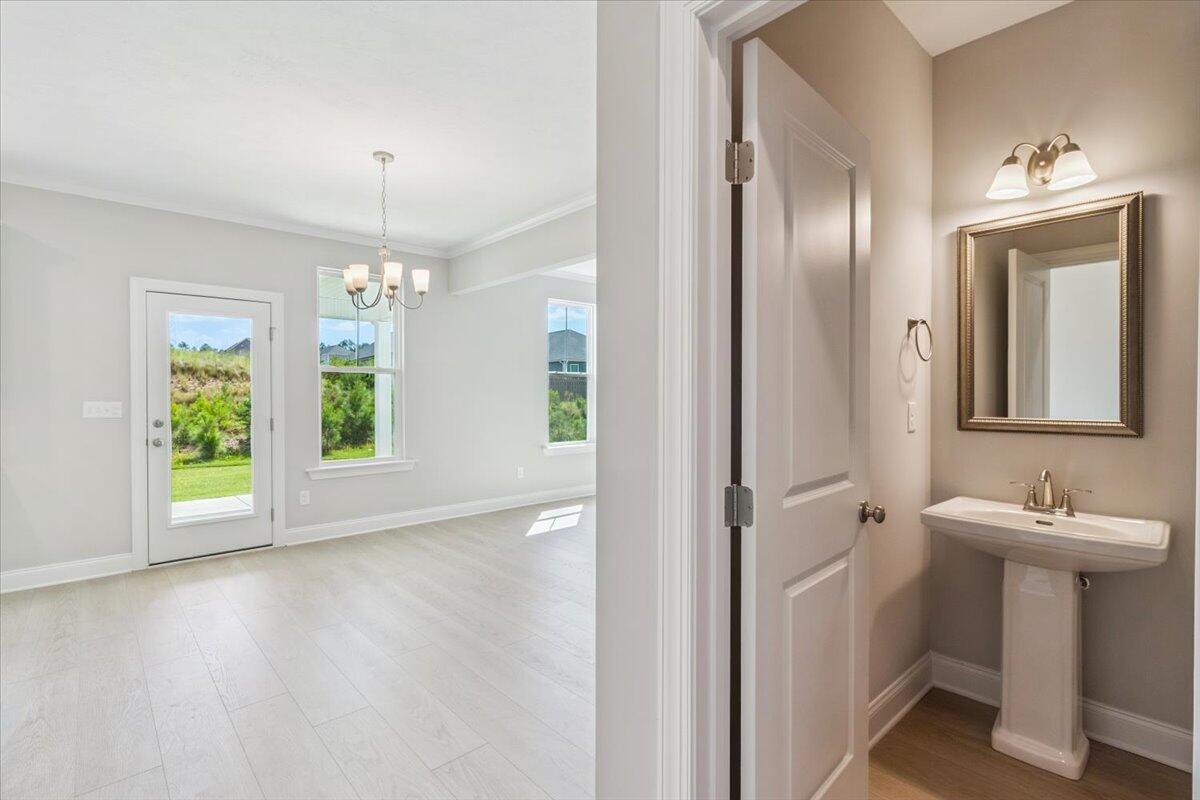 557 Hampton Drive, Unit WD103 North Augusta, SC 29860 - Photo 14 of 39 14-Powder Room_ Garage Step-In