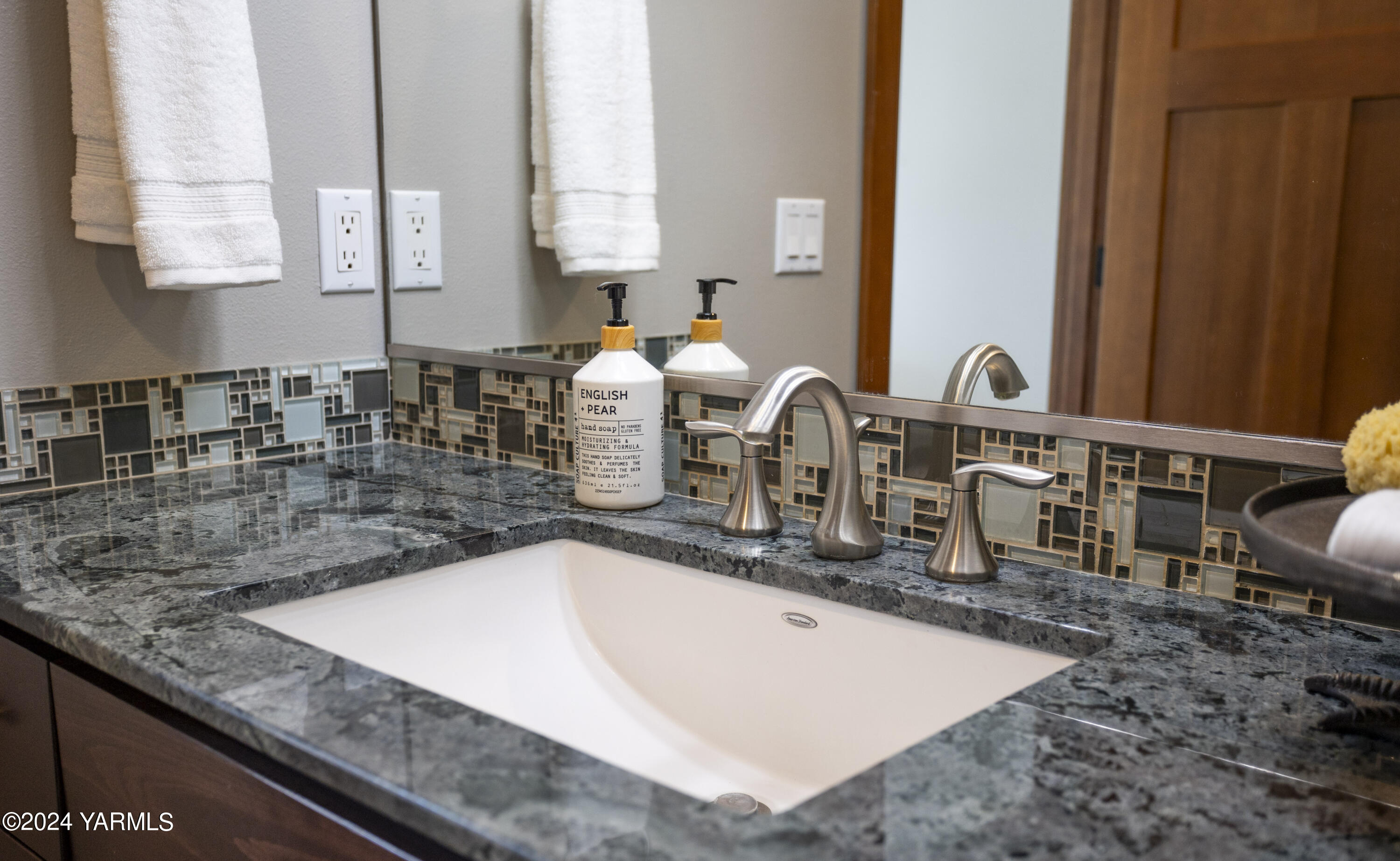 7115 1396 Private Road Southwest Prosser, WA 99350 - Photo 22 of 47 a kitchen with kitchen island granite countertop a sink and a counter top space