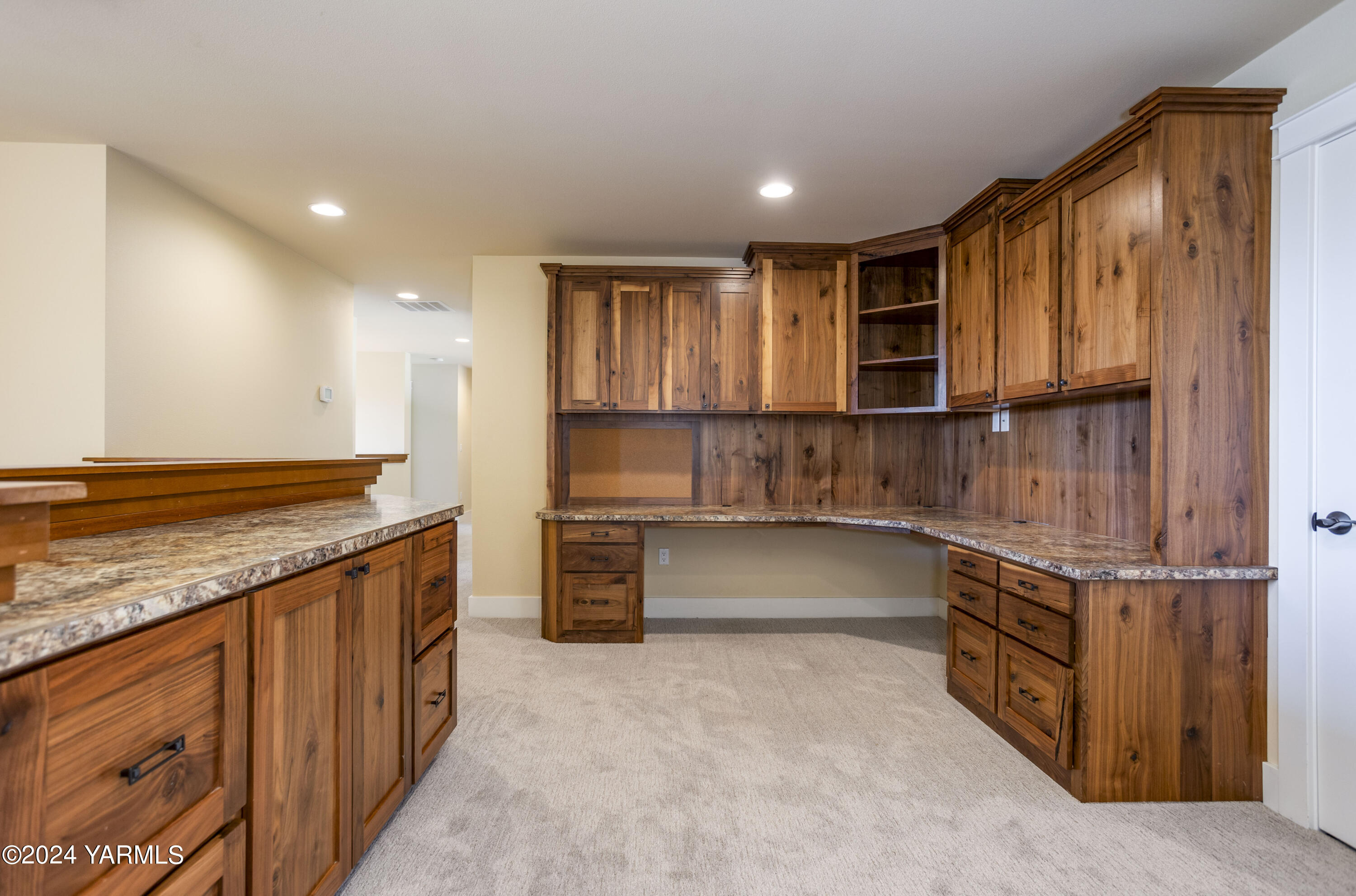 7115 1396 Private Road Southwest Prosser, WA 99350 - Photo 31 of 47 a kitchen with stainless steel appliances granite countertop a sink and cabinets