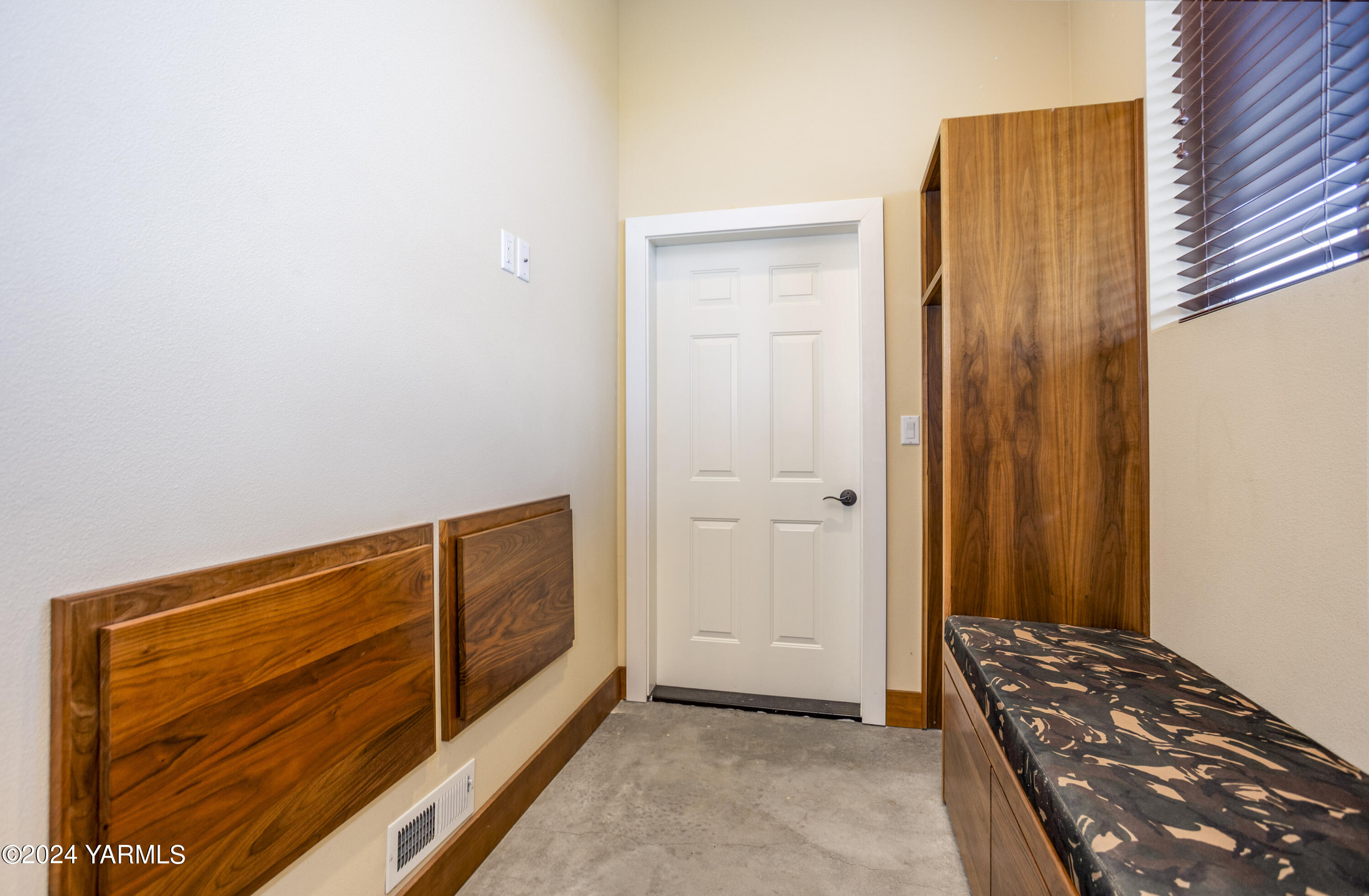 7115 1396 Private Road Southwest Prosser, WA 99350 - Photo 39 of 47 a view of walk in closet with wooden floor