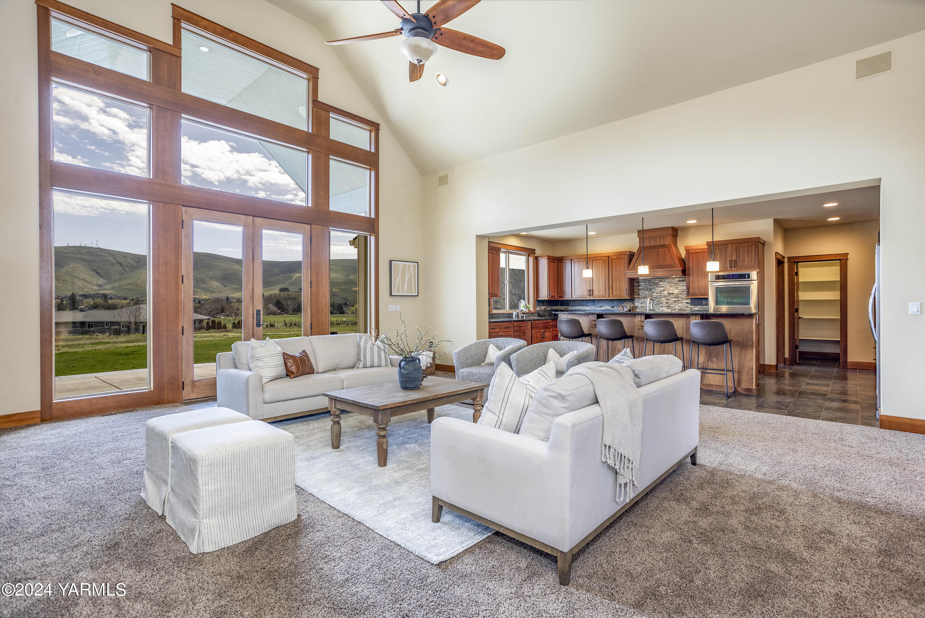 7115 1396 Private Road Southwest Prosser, WA 99350 - Photo 5 of 47 a living room with furniture and a large window