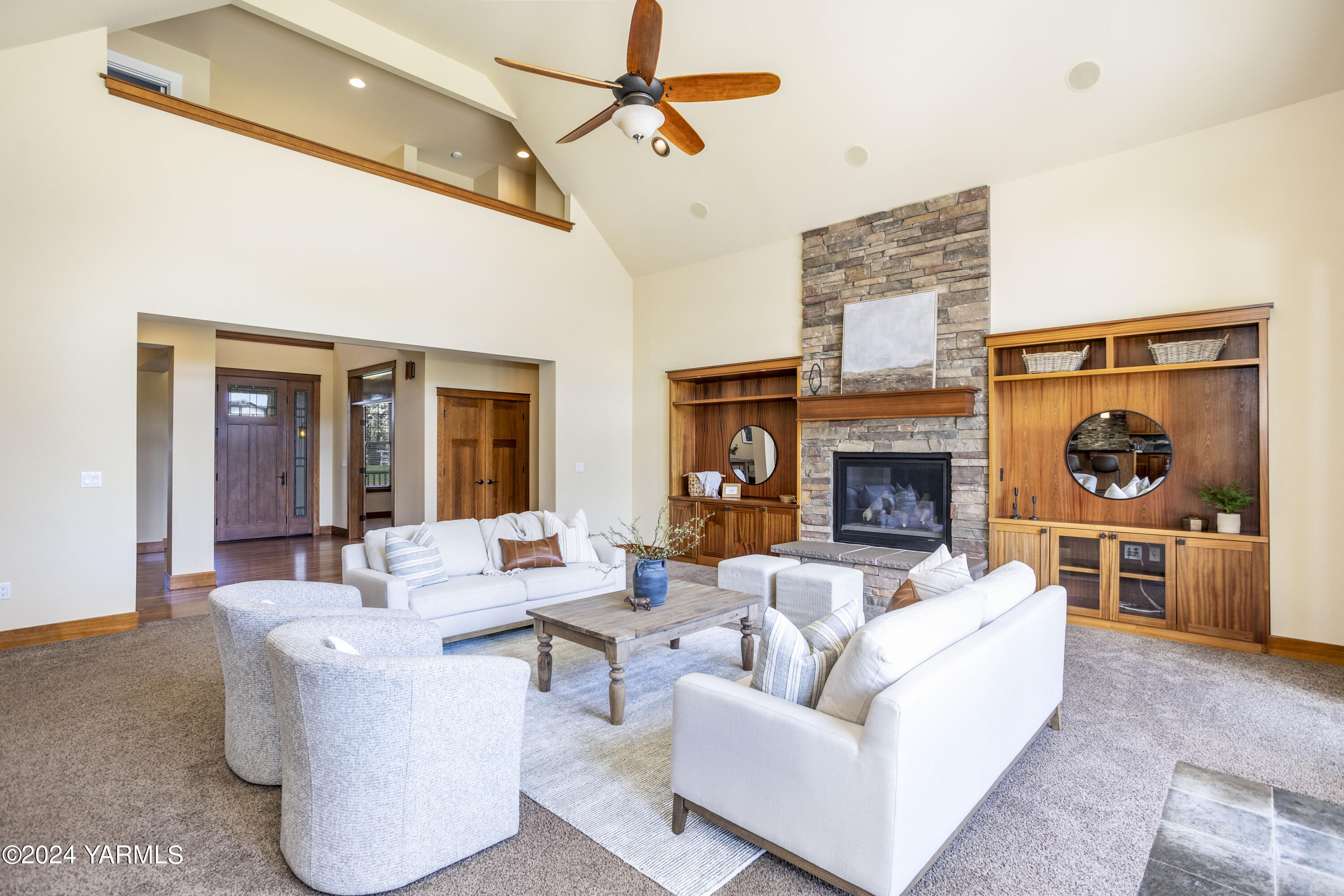 7115 1396 Private Road Southwest Prosser, WA 99350 - Photo 6 of 47 a living room with furniture and a fireplace