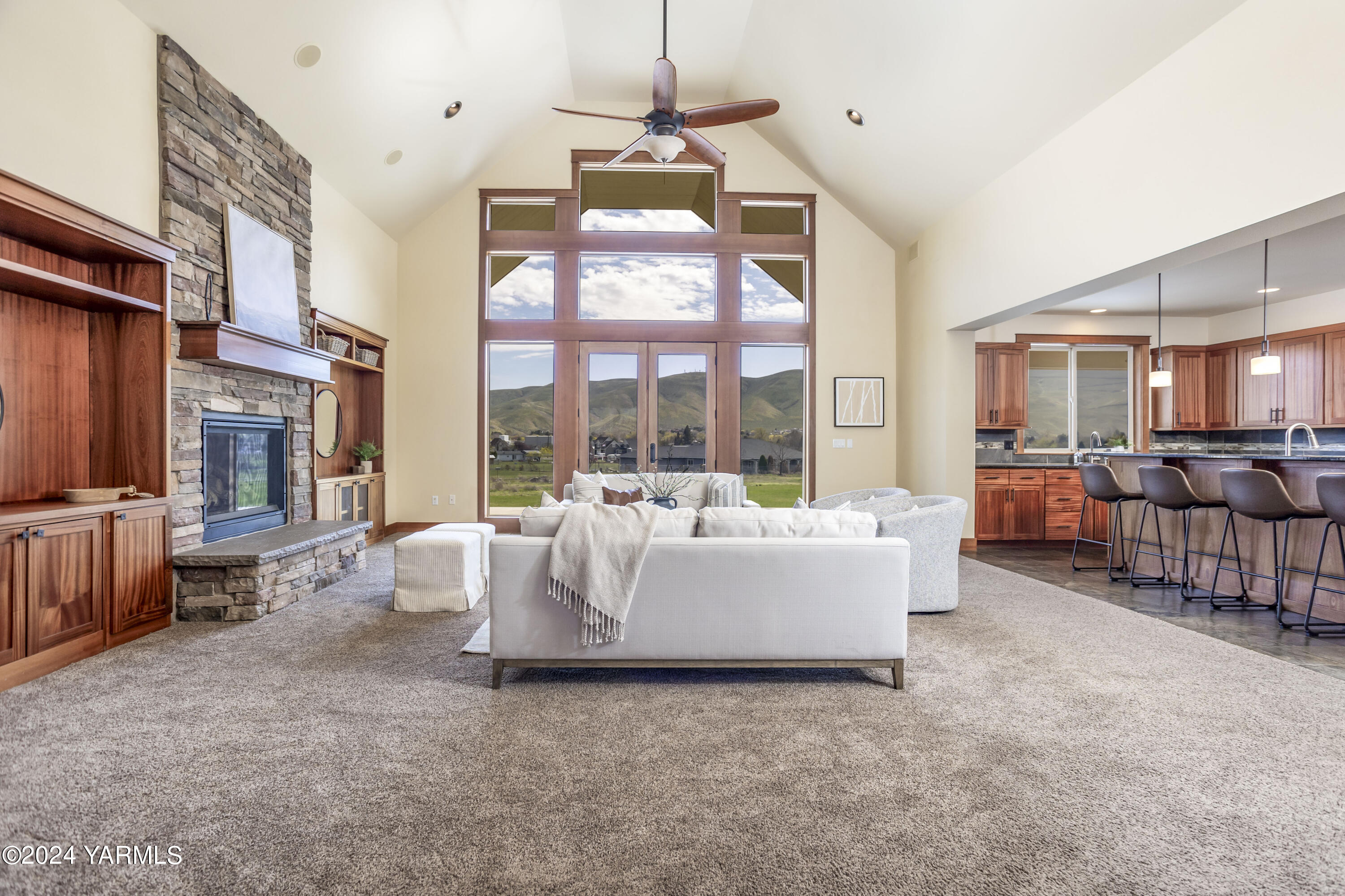 7115 1396 Private Road Southwest Prosser, WA 99350 - Photo 7 of 47 a living room with furniture and a large window