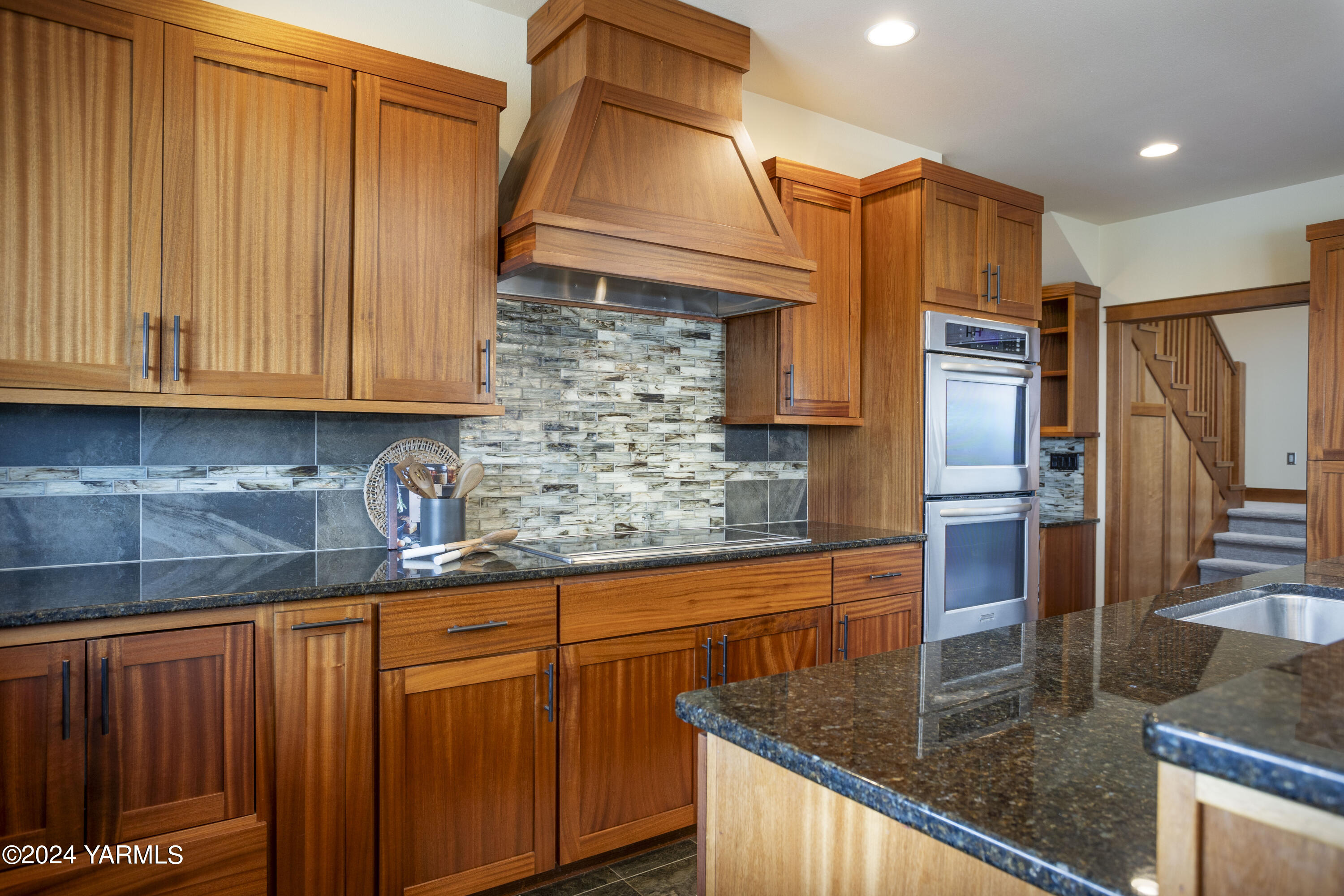 7115 1396 Private Road Southwest Prosser, WA 99350 - Photo 10 of 47 a kitchen with stainless steel appliances granite countertop a refrigerator and a sink