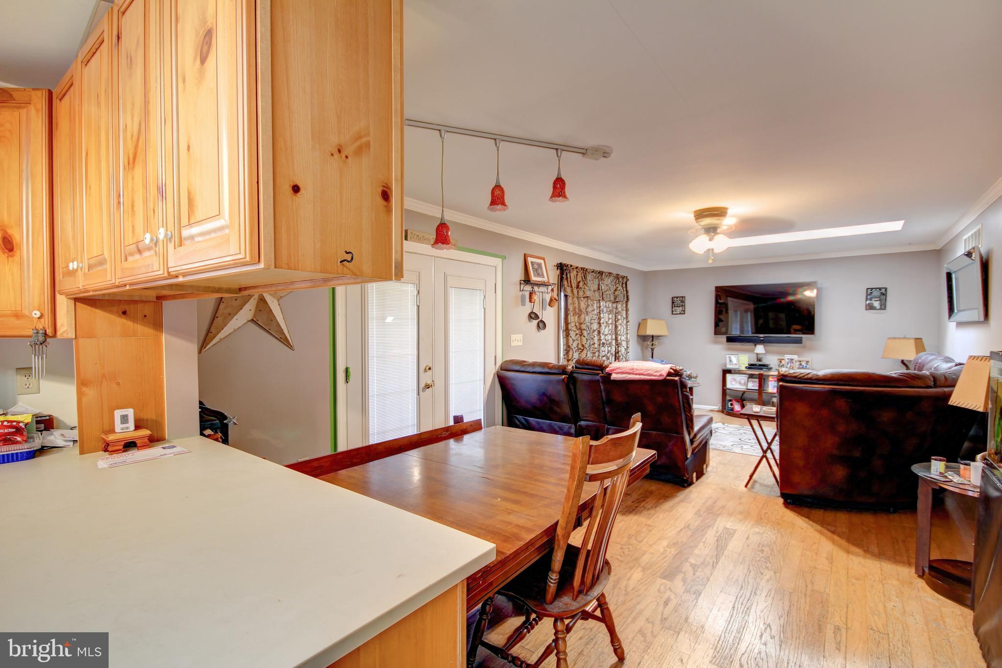 3450 Baker Road Westminster, MD 21157 - Photo 11 of 45 Kitchen into dining and living rooms