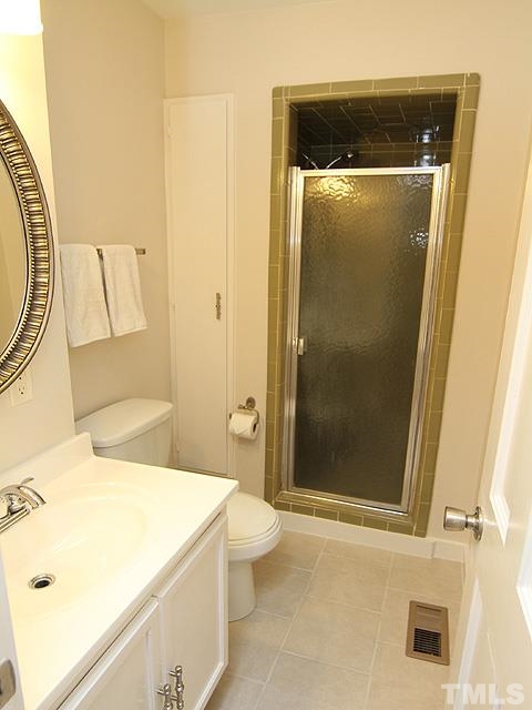 3819 Pickett Road Durham, NC 27705 - Photo 17 of 25 Third full-bath located off the bonus room. Includes tile floor and updated sink/fixtures.